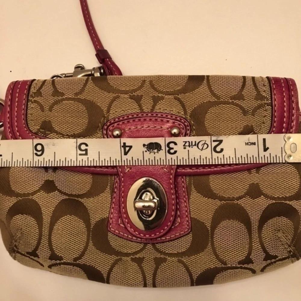 Coach signature brown dark pink leather wristlet